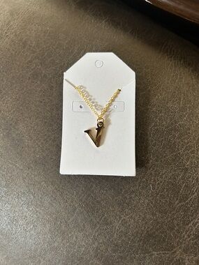V gold plated pendant
